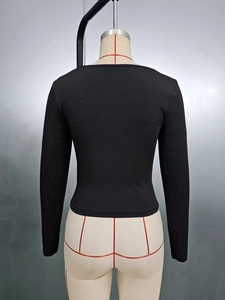 Back view of slim fit black long sleeve t-shirt with square neck on mannequin