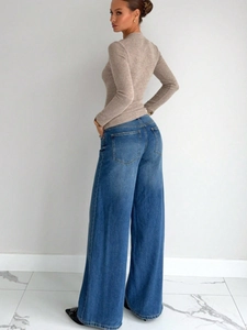 Classic blue high waist wide leg jeans paired with a slim camel knit sweater top