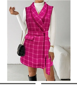 Detail of rose red plaid tweed vest jacket with adjustable waist belt and V-neckline