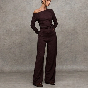 Women's dark brown two-piece set featuring off-shoulder long sleeve top and wide-leg pants