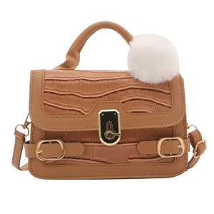 Brown crocodile texture small square handbag with golden buckles and white faux fur pompom