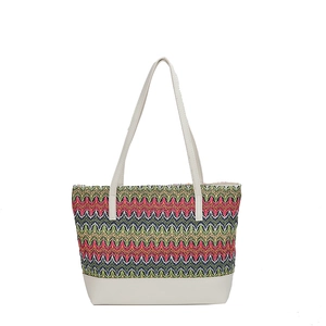 Rainbow woven straw tote bag with cream leather straps for summer vacation style