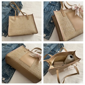 Detail view of large straw tote bag with floral scarf and spacious interior storage