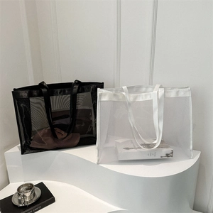 Minimalist black and white mesh tote bags for women showing large capacity and breathable design