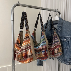 Bohemian hobo shoulder bags with ethnic geometric patterns and colorful tassel charms