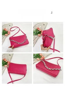 Multi-angle view of rose red pleated crossbody bag with decorative silver chain strap