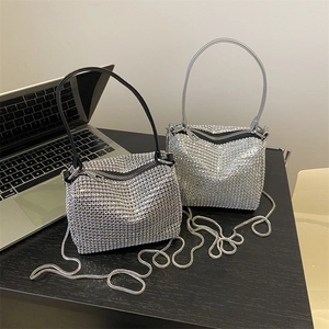 Elegant rhinestone shoulder bag with silver crystals and sparkling chain strap