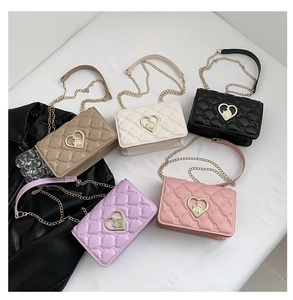 Detail of five-color quilted crossbody bags with heart-shaped metal twist locks