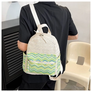 Detail of woven fabric texture and colorful geometric patterns on a casual backpack