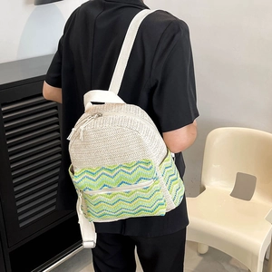Ethnic style woven backpack for women featuring colorful chevron patterns and top handle