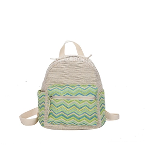 Ethnic knit backpack with colorful wave patterns and white woven top for casual wear