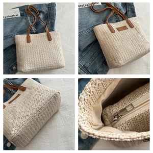 Détails du sac cabas tissé avec anses en cuir marron et fermeture éclair métallique
