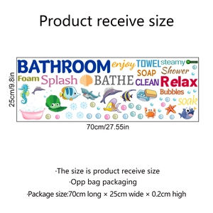 Detail of colorful underwater wall decals with marine life figures and bathroom text