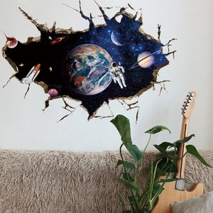 3D outer space wall sticker with astronaut and planets through cracked wall effect