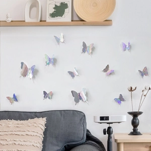Detail of 3D holographic silver butterfly wall stickers in a minimalist living room