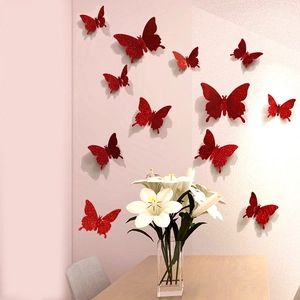 Macro detail of red glitter 3D butterfly wall stickers with foldable wings for home decor