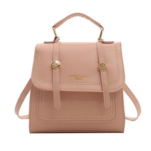 Rosafarbene Aktentasche und Rucksack im Retro-College-Stil mit goldenen Metalldetails