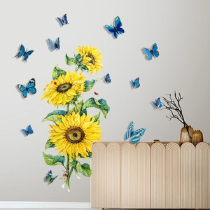 Detalle de pegatinas de pared de girasoles 3D con mariposas azules en pared gris neutra