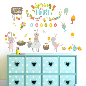 Detail of hand-drawn Easter wall stickers featuring cartoon bunnies and colorful eggs