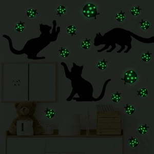 Luminous wall stickers featuring black cat silhouettes and glowing ladybugs for room decor