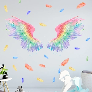 Detailed view of watercolor rainbow angel wings wall stickers in a cozy nursery bedroom