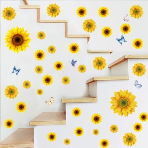 Detailed wall sticker layout featuring sunflowers and butterflies on a white staircase wall