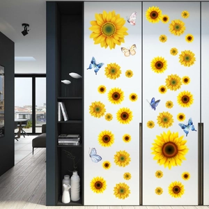 Detailed view of sunflower and butterfly stickers applied to a modern white wardrobe