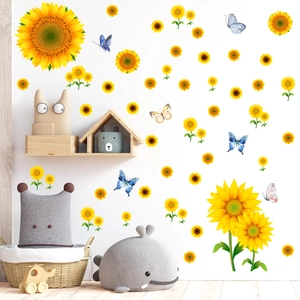 Vibrant sunflower and butterfly wall decals set decorating a cozy nursery interior