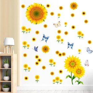 Detailed view of vibrant sunflower and butterfly wall decals on a minimalist white wall