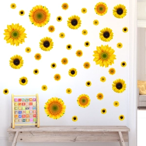 Detail of vibrant yellow sunflower wall stickers applied to a white bedroom wall