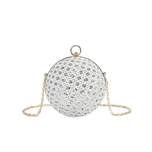 Elegant white spherical evening clutch bag with gold ring handle and metal chain strap