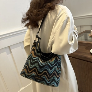 Women's 2025 spring woven bucket bag with wave pattern and leather shoulder strap