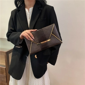 Elegant dark brown crocodile pattern envelope clutch bag with gold metal trim for women