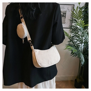 Off-white corduroy crescent shoulder bag with matching round coin purse detail