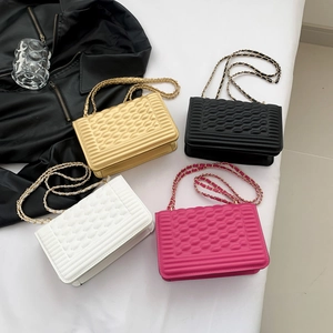 Quilted chain shoulder bag for women in gold, black, white, and rose pink variants
