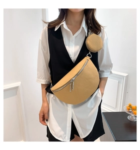Detail of khaki pebbled leather crescent waist bag with detachable round coin purse