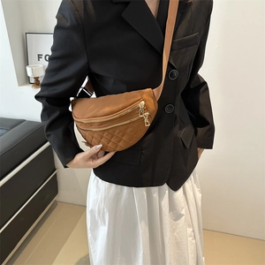 Stylish brown quilted chain waist bag with double gold zippers and wide shoulder strap