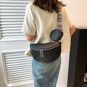 Fashionable black crescent moon crossbody bag with bubble texture and geometric wide strap