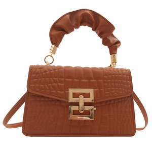 Brown crocodile embossed small square handbag with gold rotating lock and ruched handle