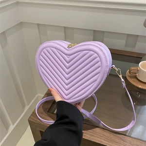 Stylish purple heart-shaped quilted handbag with elegant gold zipper for women