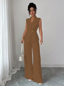 Detail shot of brown tailored vest and high-waist wide-leg trousers for a professional look