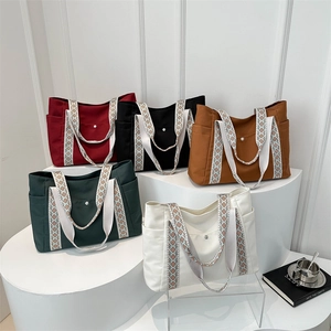 Multi-color canvas tote bag collection with ethnic style straps and large capacity