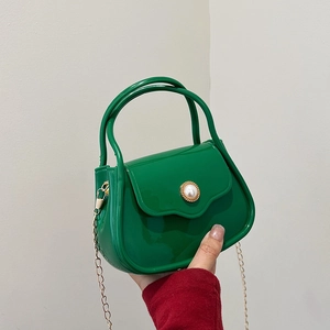 Mini jelly handbag in bright green PVC with pearl clasp and golden chain strap