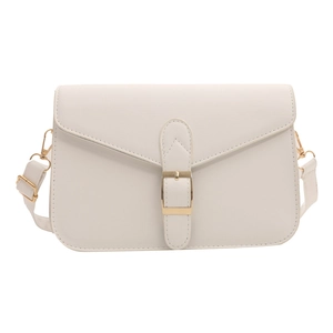 Minimalist white faux leather crossbody bag with gold buckle and adjustable strap