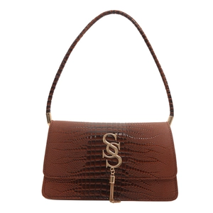 Dark brown faux crocodile leather shoulder bag with a gold metal clasp and chain tassel