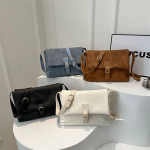 Bolso bandolera vintage de gran capacidad en azul denim, marrón, negro y blanco crema