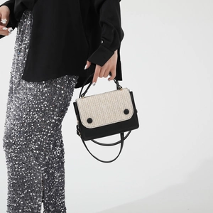 Fashionable black leather and beige woven crossbody bag with chain and handle for women