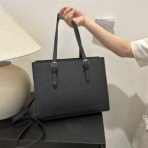 Chic black Saffiano leather tote bag for women with silver metal buckle details