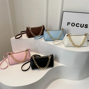 Fashionable underarm baguette bags with gold chain detail in five versatile colors