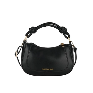 Chic black arc-shaped faux leather crossbody bag with knotted handle and gold hardware